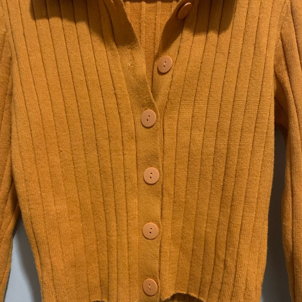 Yellow button up sweater